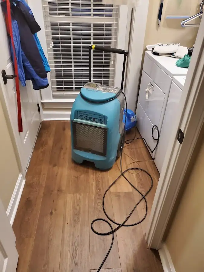 Commercial dehumidifier deployed for Flood Damage Cleanup in Baxter Village
